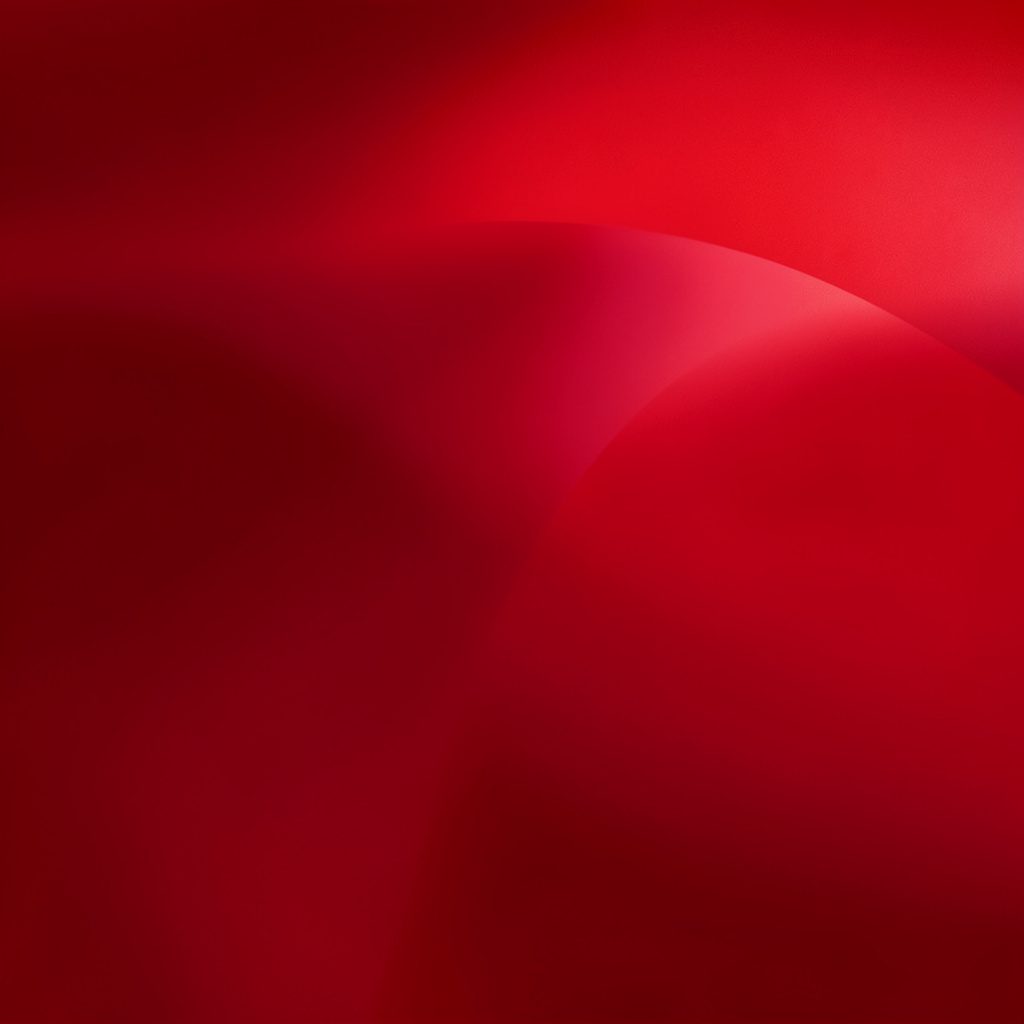 An abstract gradient from warm coral to deep indigo, rich and atmospheric.